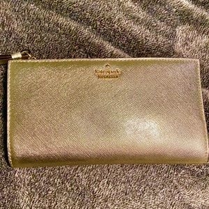 Gold Shimmer Kate Spade Wrist wallet. Hardly used